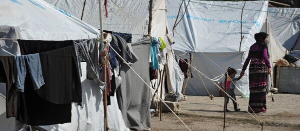 Лагерь беженцев в Латакии - Sputnik Литва