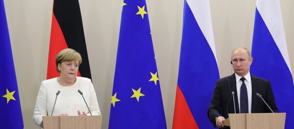 Vladimiras Putinas ir Angela Merkel Vladimiras Putinas ir Angela Merkel - Sputnik Lietuva