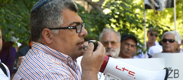 Mitingas prieš Lietuvos žydų bendruomenės pirmininkės valdžios uzurpaciją Mitingas prieš Lietuvos žydų bendruomenės pirmininkės valdžios uzurpaciją - Sputnik Lietuva