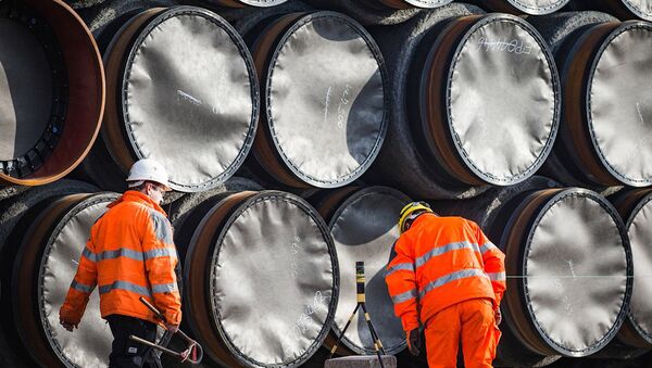 Склад временного хранения труб около порта Мукран в Германии для строительства Nord Stream 2 - Sputnik Литва