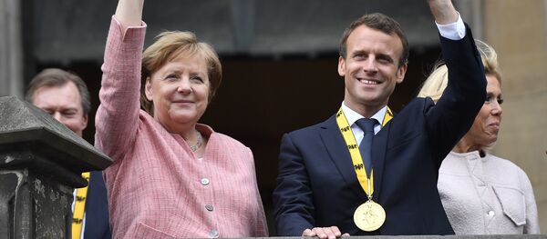 Канцлер Германии Ангела Меркель и президент Франции Эмманюэль Макрон - Sputnik Литва