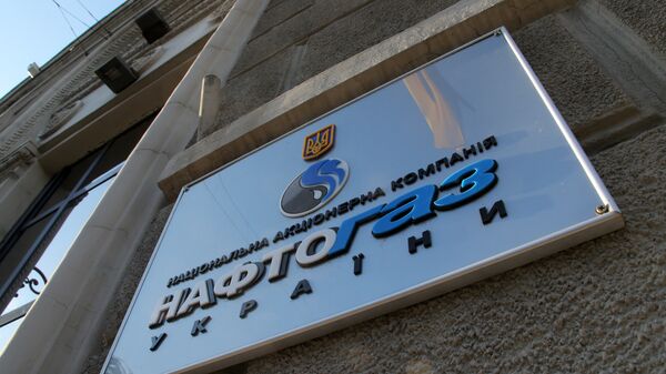 Вывеска нефтегазового холдинга Нафтогаз Украины на административном здании в Киеве - Sputnik Литва
