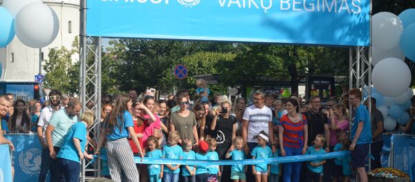 Забег Unicef в Вильнюсе, 15 июня 2018 года Забег Unicef в Вильнюсе, 15 июня 2018 года - Sputnik Lietuva