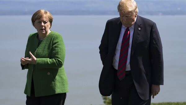 Канцлер германии Ангела Меркель и президент США Дональд Трамп на встрече G7 в Канаде, 8 июня 2018 года - Sputnik Литва