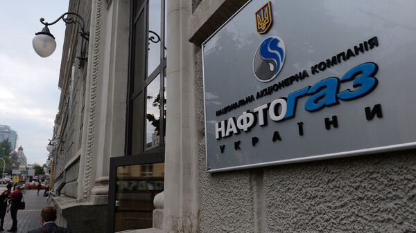 Вывеска нефтегазового холдинга Нафтогаз Украины на административном здании в Киеве, архивное фото - Sputnik Литва