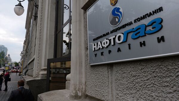 Вывеска нефтегазового холдинга Нафтогаз Украины на административном здании в Киеве, архивное фото - Sputnik Lietuva
