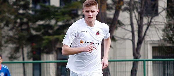 Нападающий сборной Литвы по футболу Каролис Лаукжемис Нападающий сборной Литвы по футболу Каролис Лаукжемис - Sputnik Литва