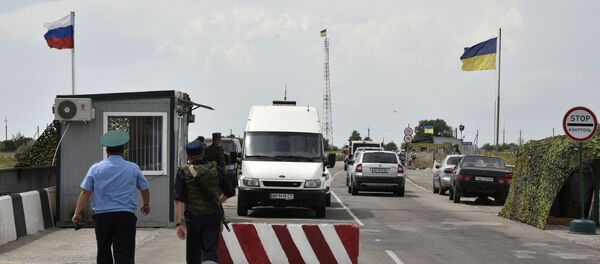 Автомобильный пункт пропуска Джанкой на российско-украинской границе Автомобильный пункт пропуска Джанкой на российско-украинской границе - Sputnik Lietuva