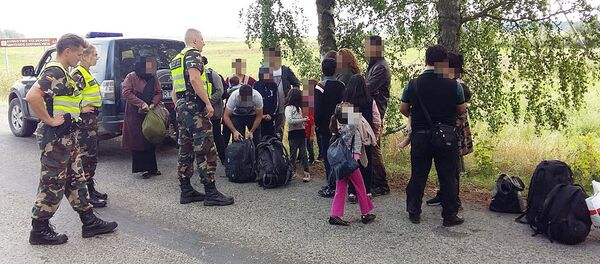 Migrantai iš Irako ir Afganistano Migrantai iš Irako ir Afganistano - Sputnik Lietuva