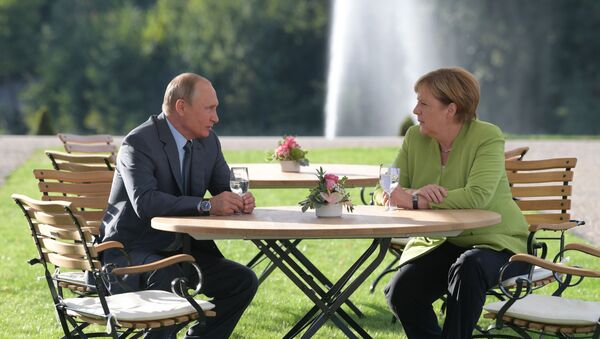 Putino ir Merkel susitikimas Berlyne - Sputnik Lietuva