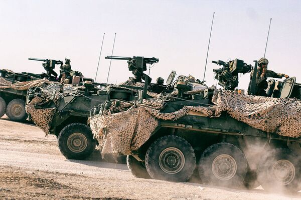 Литовские военные завершили участие в американских учениях NTC 18.9 Литовские военные завершили участие в американских учениях NTC 18.9 - Sputnik Литва