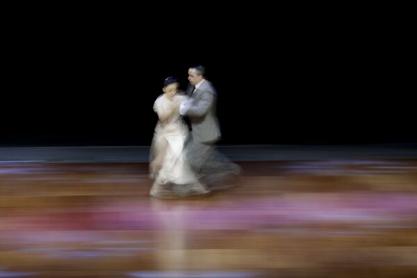 Аргентниская пара Federico Ibanez и Nuria Lazo во время выступления на чемпионате мира по танго в Аргентине - Sputnik Литва