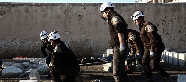 Активисты из организации Белые каски в Сирии, архивное фото - Sputnik Литва