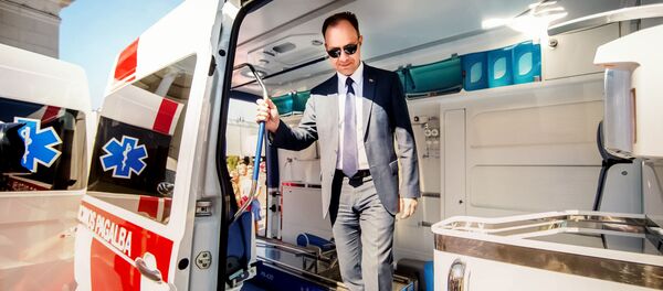 Министр здравоохранения Аурелиюс Верига в машине скорой помощи, архивное фото Министр здравоохранения Аурелиюс Верига в машине скорой помощи, архивное фото - Sputnik Литва