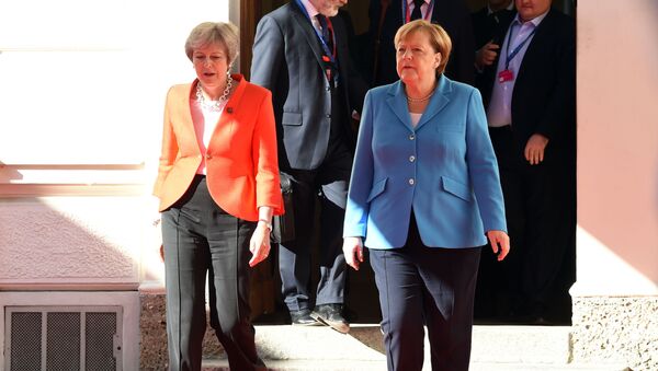 Ангела Меркель и Тереза Мэй на неофициальном саммите  глав государств и правительств ЕС в Зальцбурге, Австрия, 20 сентября 2018 года - Sputnik Литва