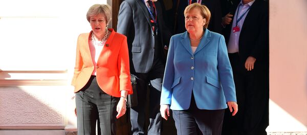 Ангела Меркель и Тереза Мэй на неофициальном саммите  глав государств и правительств ЕС в Зальцбурге, Австрия, 20 сентября 2018 года - Sputnik Литва