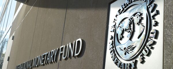 Табличка с логотипом Международного валютного фонда на стене здания МВФ - Sputnik Литва