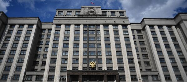Здание Государственной Думы РФ на улице Охотный ряд в Москве - Sputnik Литва