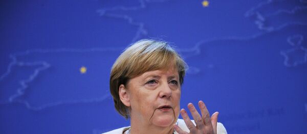 Канцлер Германии Ангела Меркель выступает на 12-м Азиатско-европейском саммите (ASEM) в Брюсселе Канцлер Германии Ангела Меркель выступает на 12-м Азиатско-европейском саммите (ASEM) в Брюсселе - Sputnik Lietuva