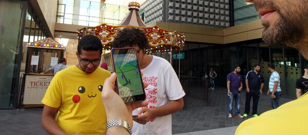 Пользователи приложения Pokemon Go для мобильных устройств Пользователи приложения Pokemon Go для мобильных устройств - Sputnik Литва