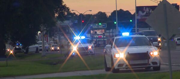 Ситуация на улицах Батон-Руж, где мужчина застрелил троих полицейских Ситуация на улицах Батон-Руж, где мужчина застрелил троих полицейских - Sputnik Lietuva