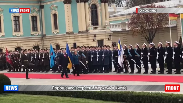 Merkel ukrainietiškai pasveikino sargybą Kijeve - Sputnik Lietuva
