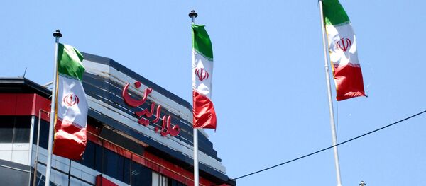 Флаги Ирана на одной из улиц Тегерана, архивное фото Флаги Ирана на одной из улиц Тегерана, архивное фото - Sputnik Литва