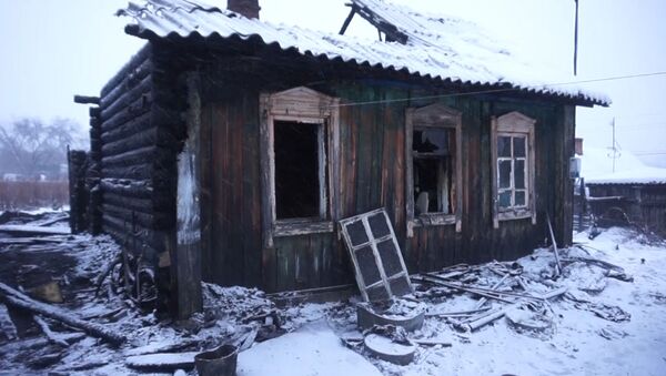 Кадры с места пожара в Кемеровской области, где погибли 8 человек - Sputnik Литва