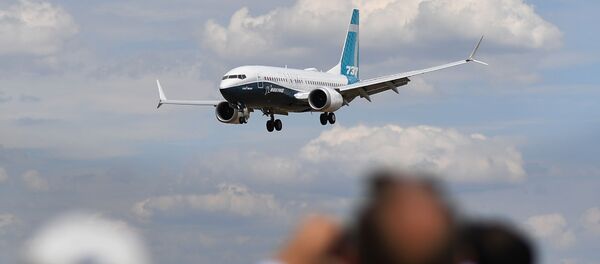 Боинг 737 Max на авиасалоне в Фарнборо, к юго-западу от Лондона, архивное фото - Sputnik Литва