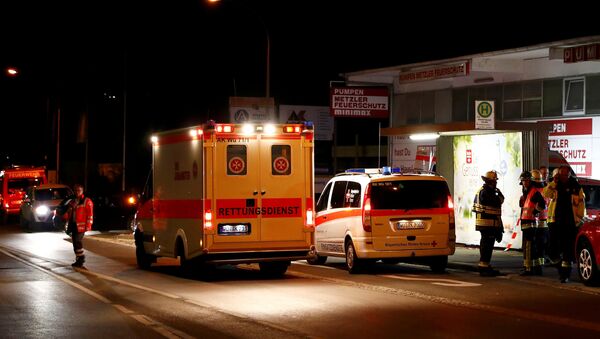 Машина скорой помощи у здания вокзала в Вюрцбурге - Sputnik Литва
