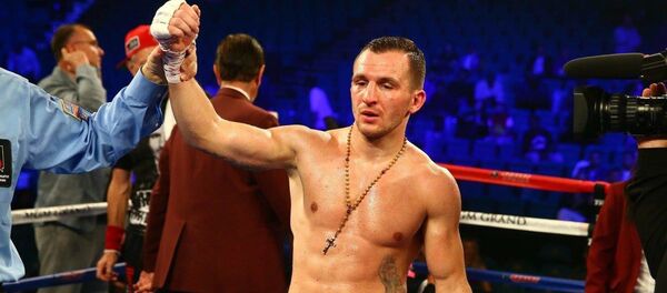 Литовский боксер Эгидиюс Каваляускас, архивное фото Литовский боксер Эгидиюс Каваляускас, архивное фото - Sputnik Литва