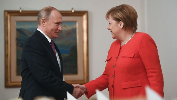 Рабочий завтрак президента России Владимира Путина и канцлера Германии Ангелы Меркель в рамках саммита G20 - Sputnik Lietuva