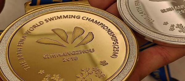 Мейлутите и Рапшис принесли Литве еще две медали на ЧМ по плаванию в Китае - Sputnik Литва