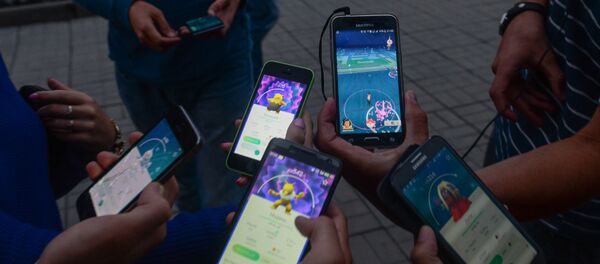 Игровое приложение Pokemon Go от компании Nintendo, архивное фото Игровое приложение Pokemon Go от компании Nintendo, архивное фото - Sputnik Литва