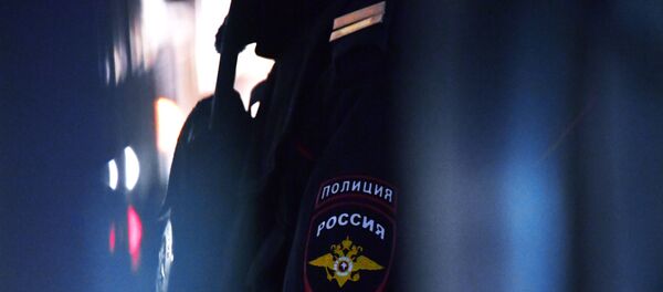 Эмблема на форме сотрудника полиции. Эмблема на форме сотрудника полиции. - Sputnik Lietuva