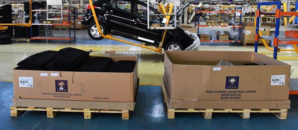 Конвейер совместного сирийско-иранского автомобильного завода SIAMCO в пригороде Дамаска Конвейер совместного сирийско-иранского автомобильного завода SIAMCO в пригороде Дамаска - Sputnik Литва