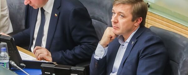 Премьер-министр Саулюс Сквернялис и глава правящей партии Рамунас Карбаускис, архивное фото - Sputnik Литва