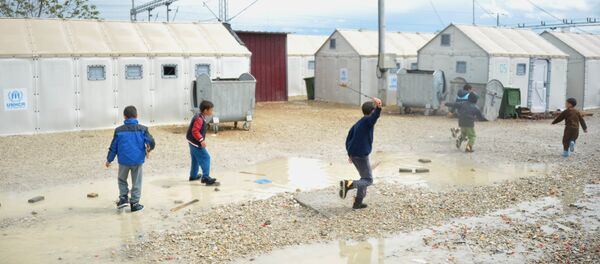 Лагерь беженцев Табановце в Македонии около македоно-сербской границы - Sputnik Литва