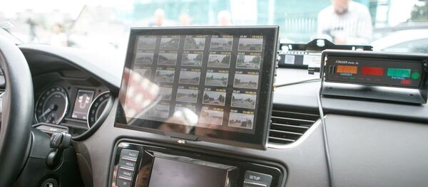 Новые радар Stalker Dual SL в полицейских машинах Литвы Новые радар Stalker Dual SL в полицейских машинах Литвы - Sputnik Литва