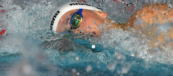 Литовский пловец Данас Рапшис, архивное фото - Sputnik Литва