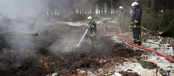 Тушение пожара, архивное фото Тушение пожара, архивное фото - Sputnik Lietuva