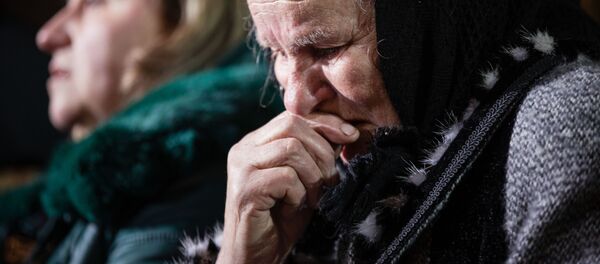 Пожилая женщина, Киев, архивное фото - Sputnik Литва