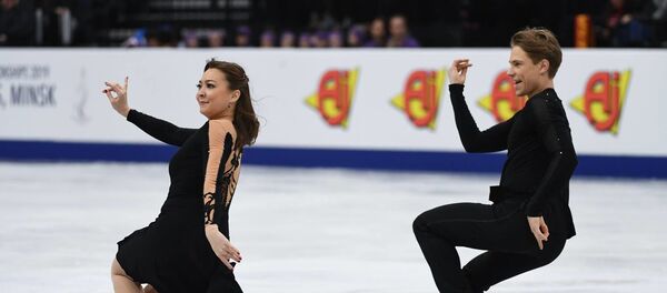 Литовские фигуристы Эллисон Рид и Саулюс Амбрулевичюс - Sputnik Литва