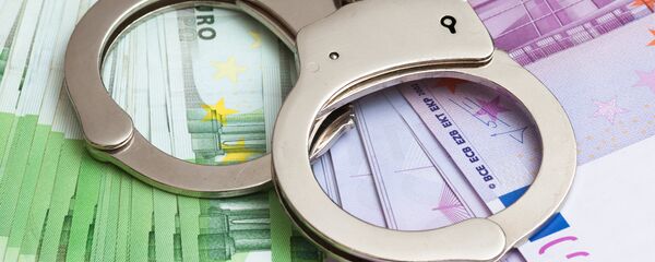 Наручники и деньги Наручники и деньги - Sputnik Литва