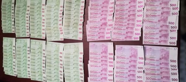 Деньги, изъятые у подозреваемых Деньги, изъятые у подозреваемых - Sputnik Lietuva