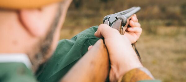 Охотник с ружьем, архивное фото - Sputnik Литва