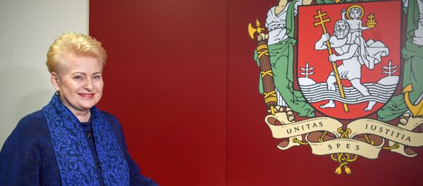 Президент Литвы Даля Грибаускайте голосует на муниципальных выборах, архивное фото Президент Литвы Даля Грибаускайте голосует на муниципальных выборах, архивное фото - Sputnik Lietuva