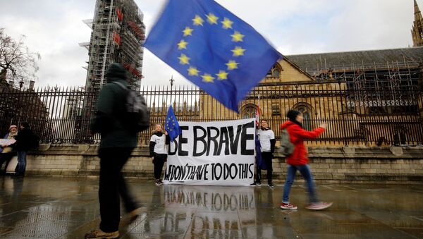 Протестующие против Brexit у парламента Британии в Лондоне, 12 марта 2019 года - Sputnik Литва