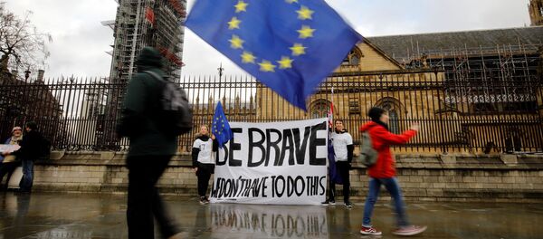 Протестующие против Brexit у парламента Британии в Лондоне, 12 марта 2019 года - Sputnik Литва