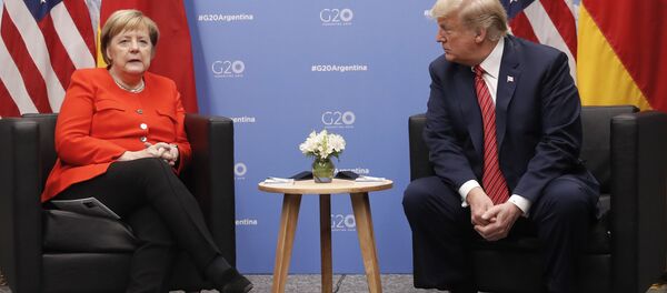 Президент Америки Донадьд Трамп и канцлер Германии Ангела Меркель, архивное фото Президент Америки Донадьд Трамп и канцлер Германии Ангела Меркель, архивное фото - Sputnik Lietuva